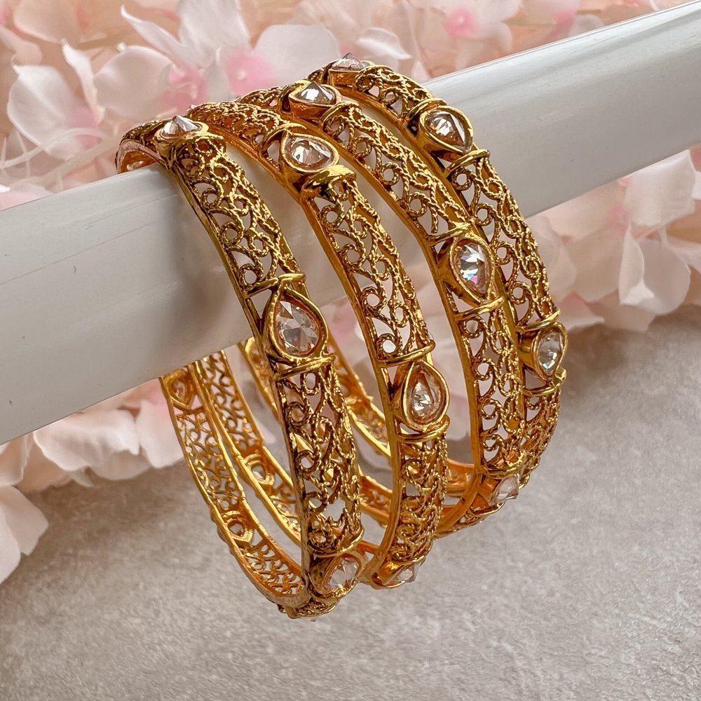 High Quality Kundan Statement Pearly Golden Kada Bangles Set – Amazel  Designs